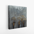 Side view of abstract textured canvas art featuring layered grey surface and raised gold umbrella figures, highlighting depth and material detail.